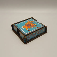 The wooden coaster set in its stand, presented as a gift with premium packaging for housewarming or birthdays.