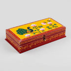 Hand-painted wooden dry fruit box with peacock and lotus artwork on a yellow lid