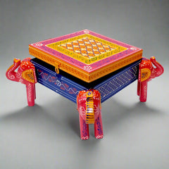 Square wooden jewelry box featuring colorful hand-painted artwork and detailed elephant carvings on all four legs.