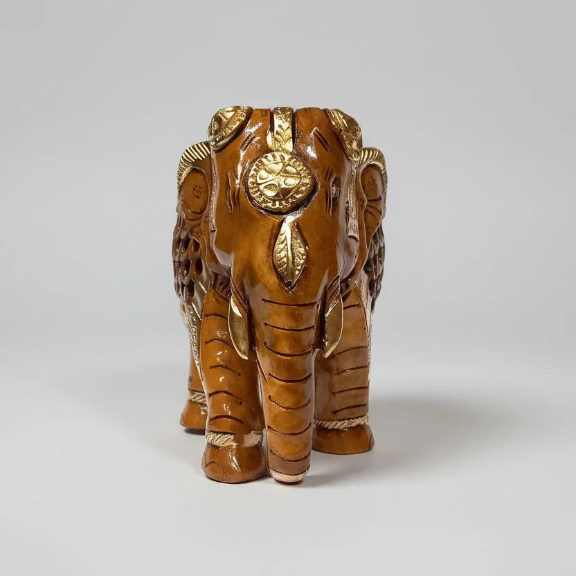 Brown and gold painted Kadam wood elephant décor showpiece with glossy finish