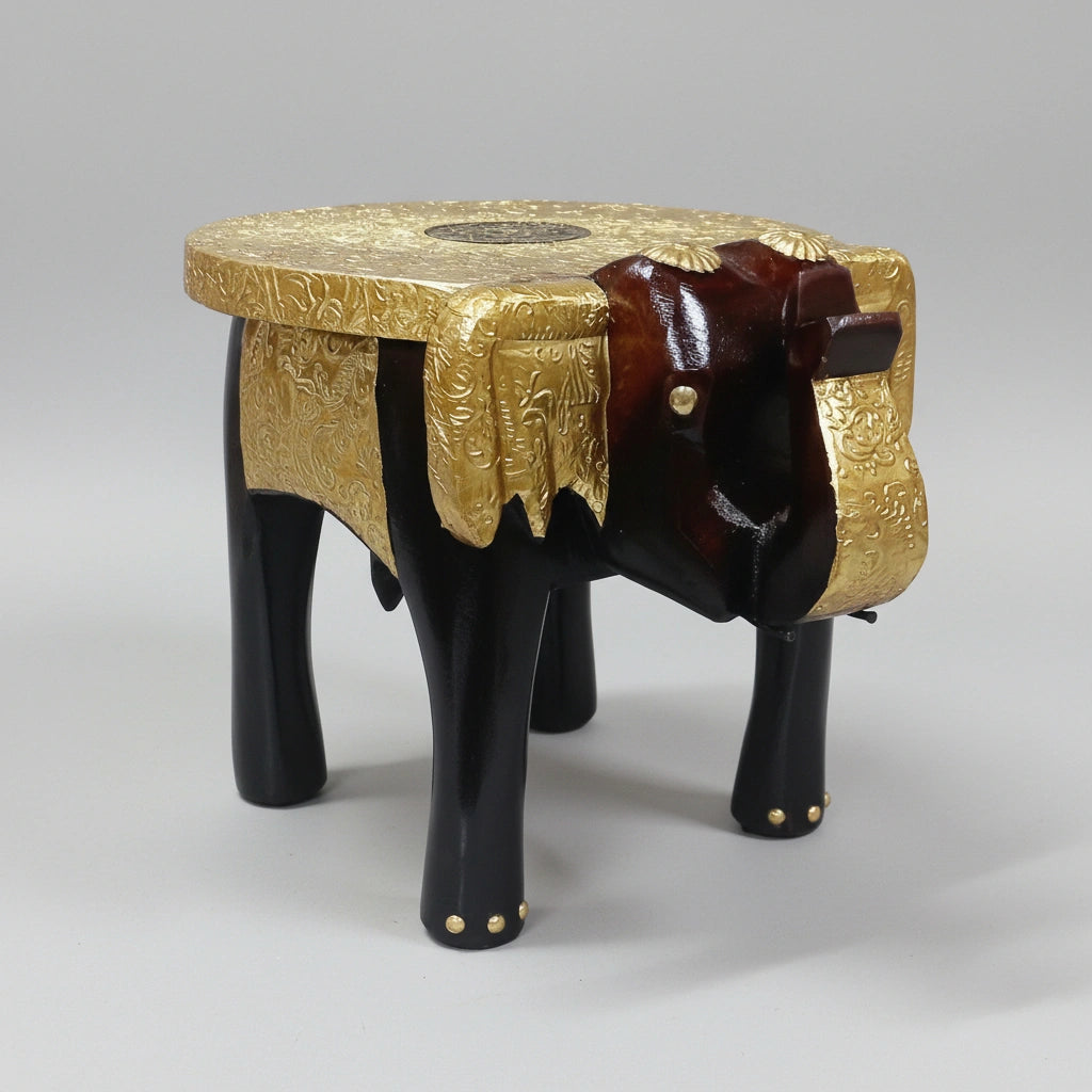 Handcrafted wooden elephant stool featuring intricate hand-hammered brass work.