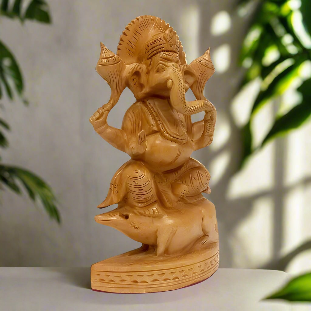 A beautiful wooden Ganpati murti that brings peace, prosperity, and wealth to a home or office.