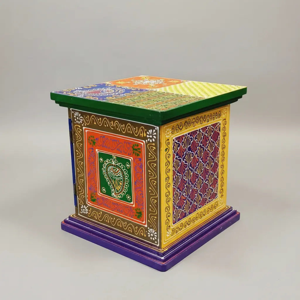 Side view of hand-painted wooden mini cabinet with traditional Indian art