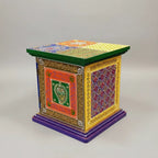 Side view of hand-painted wooden mini cabinet with traditional Indian art