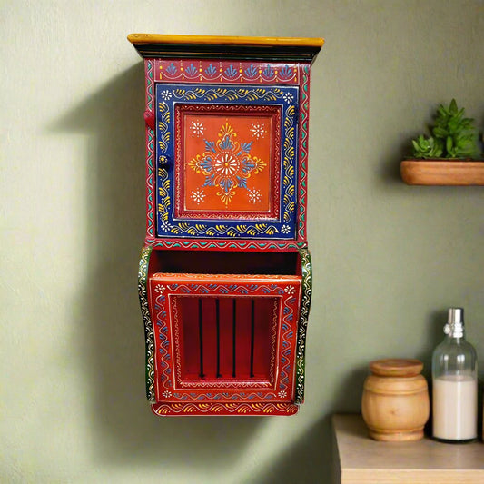 Hand-painted wooden key and paper holder with vibrant multicolor design, wall decor piece