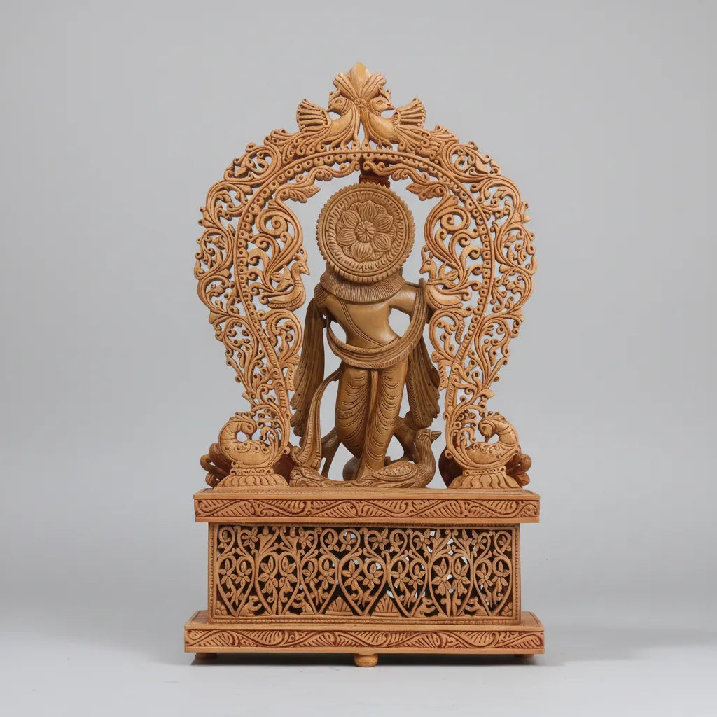 Back view of handcrafted wooden Krishna idol showing intricate jali arch detailing — Jaipur wood carving