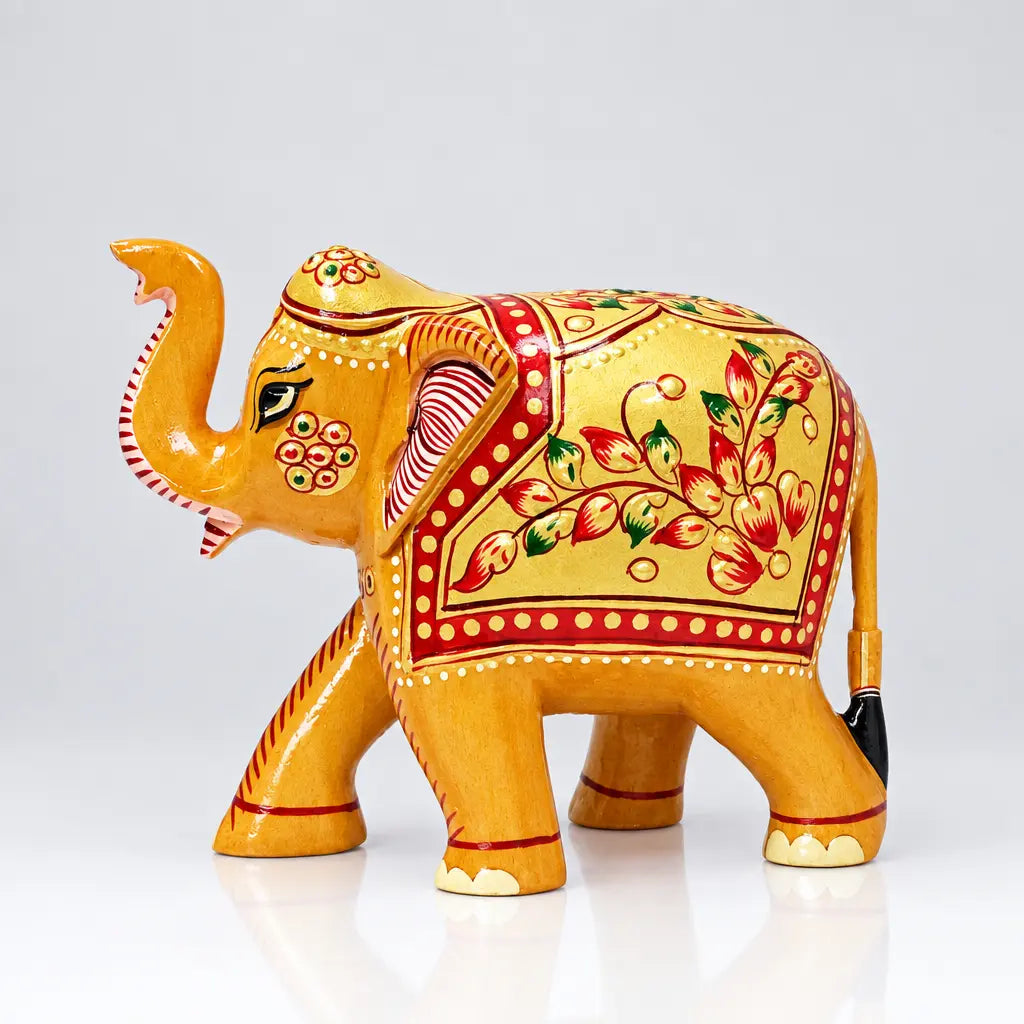 Single-piece handcrafted wooden lucky elephant with high raised trunk and colorful emboss painting.