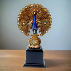 Intricately carved wooden peacock memento in dancing pose