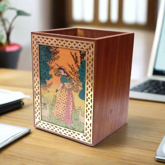 Wooden pen stand made of Sheesham wood with pure brass borders.