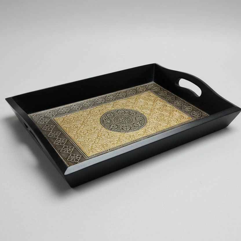 Top view of a sturdy wooden tray featuring an embossed gold and copper floral metal sheet design.