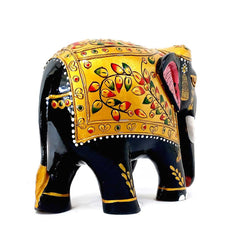 A 15cm handcrafted wooden elephant showpiece with beautiful embossed painting on its body.