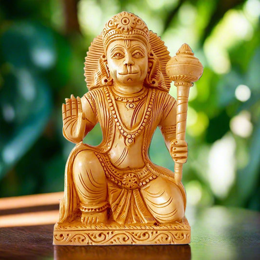 wooden sitting hanuman statue