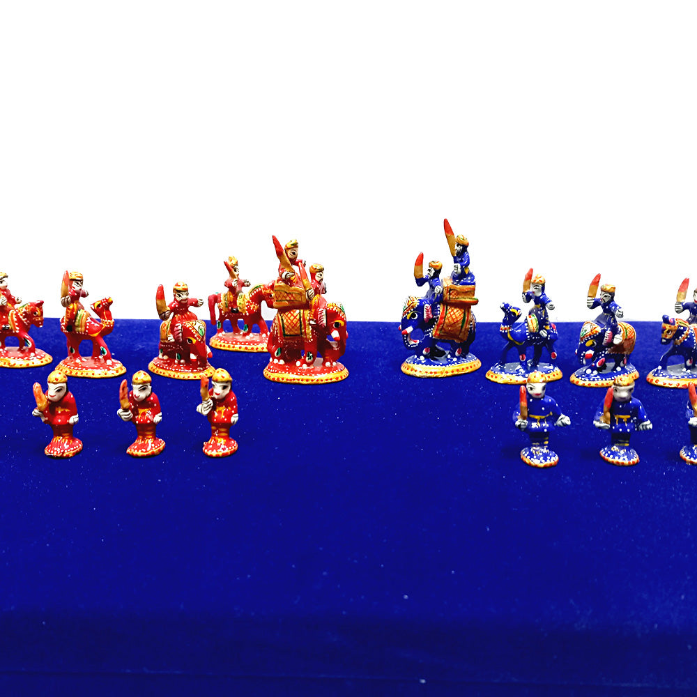 Closeup 8cm Ambari elephant king chess piece with red blue enamel painting.