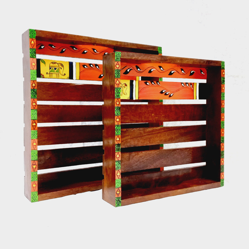 Artisan-crafted pair of wooden trays decorated with colorful handmade paintings, combining utility with elegance.