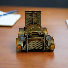 Artistic vintage car metal pen stand featuring circular pen holder and antique design, enhancing office decor.