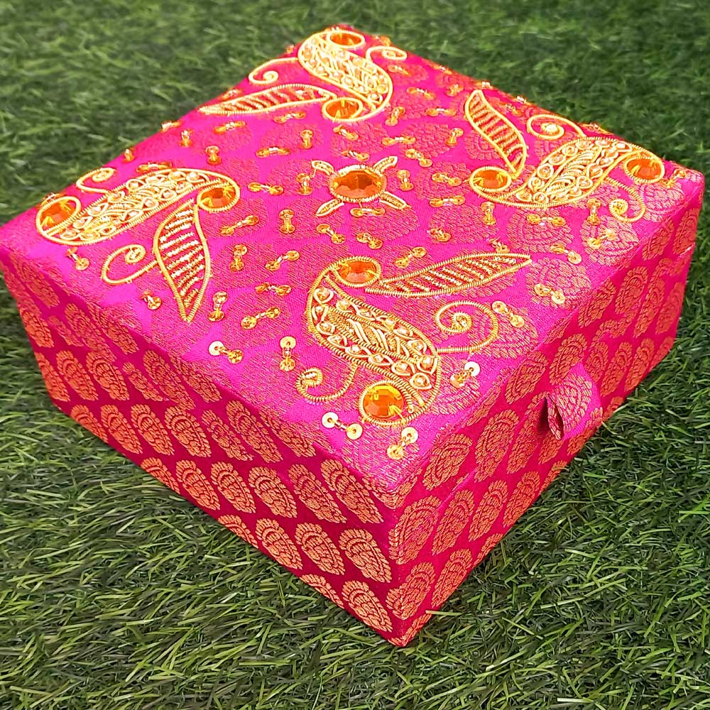 Zardosi makeup box in assorted colors with intricate golden wire and sequin embroidery on silk.