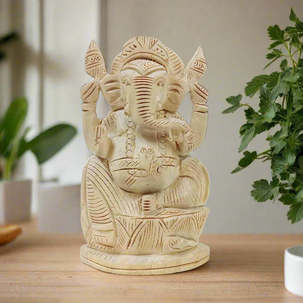 An auspicious Ganesh idol made of Sevan wood with very good hand carving.