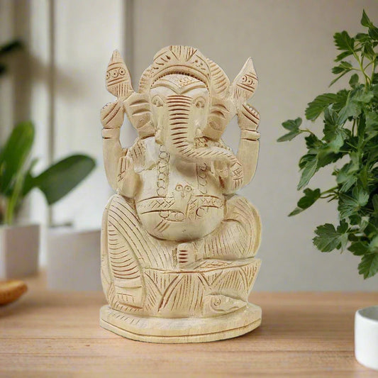An auspicious Ganesh idol made of Sevan wood with very good hand carving.