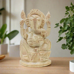 An auspicious Ganesh idol made of Sevan wood with very good hand carving.