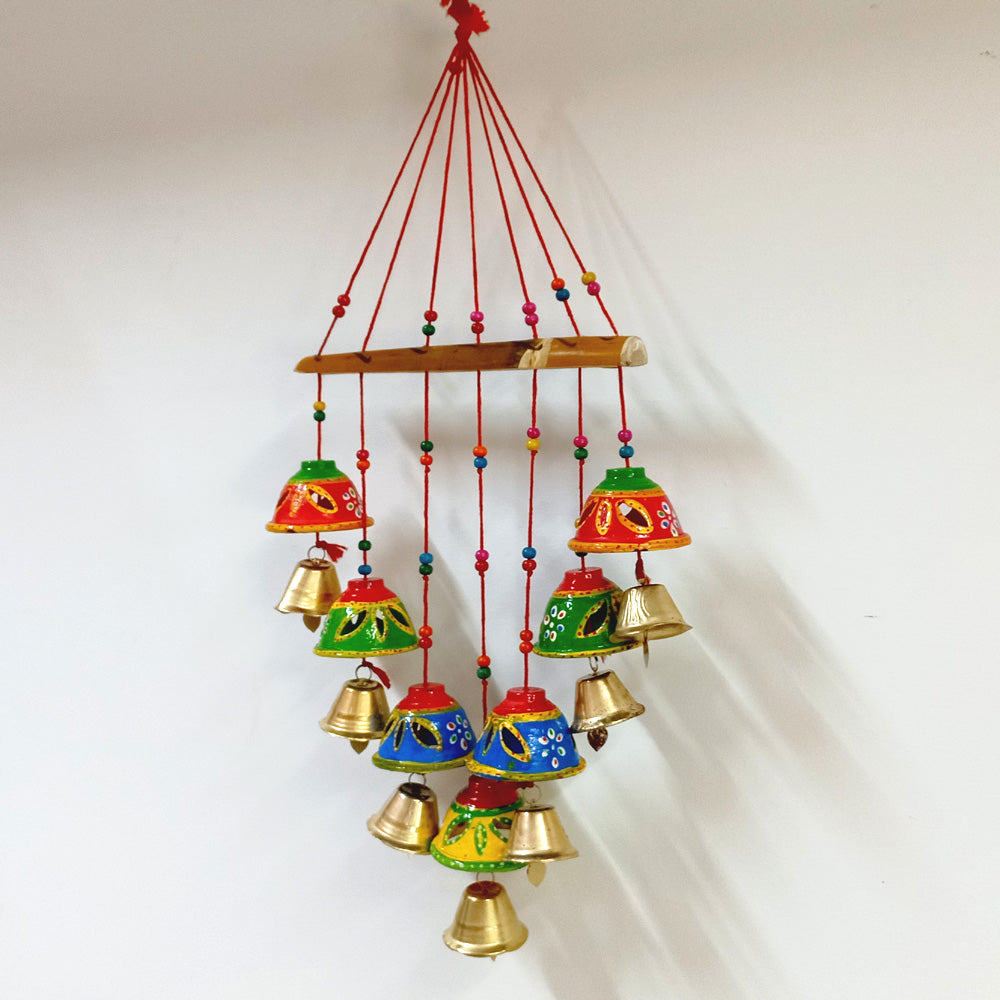 Auspicious wind chime toran with shiny bells and beaded decoration, ideal as a home gift.