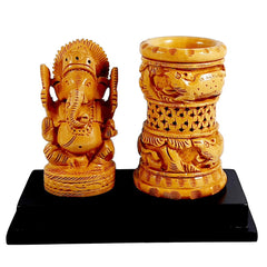 An auspicious wooden Ganesh pen stand that brings happiness and prosperity to your home and office.