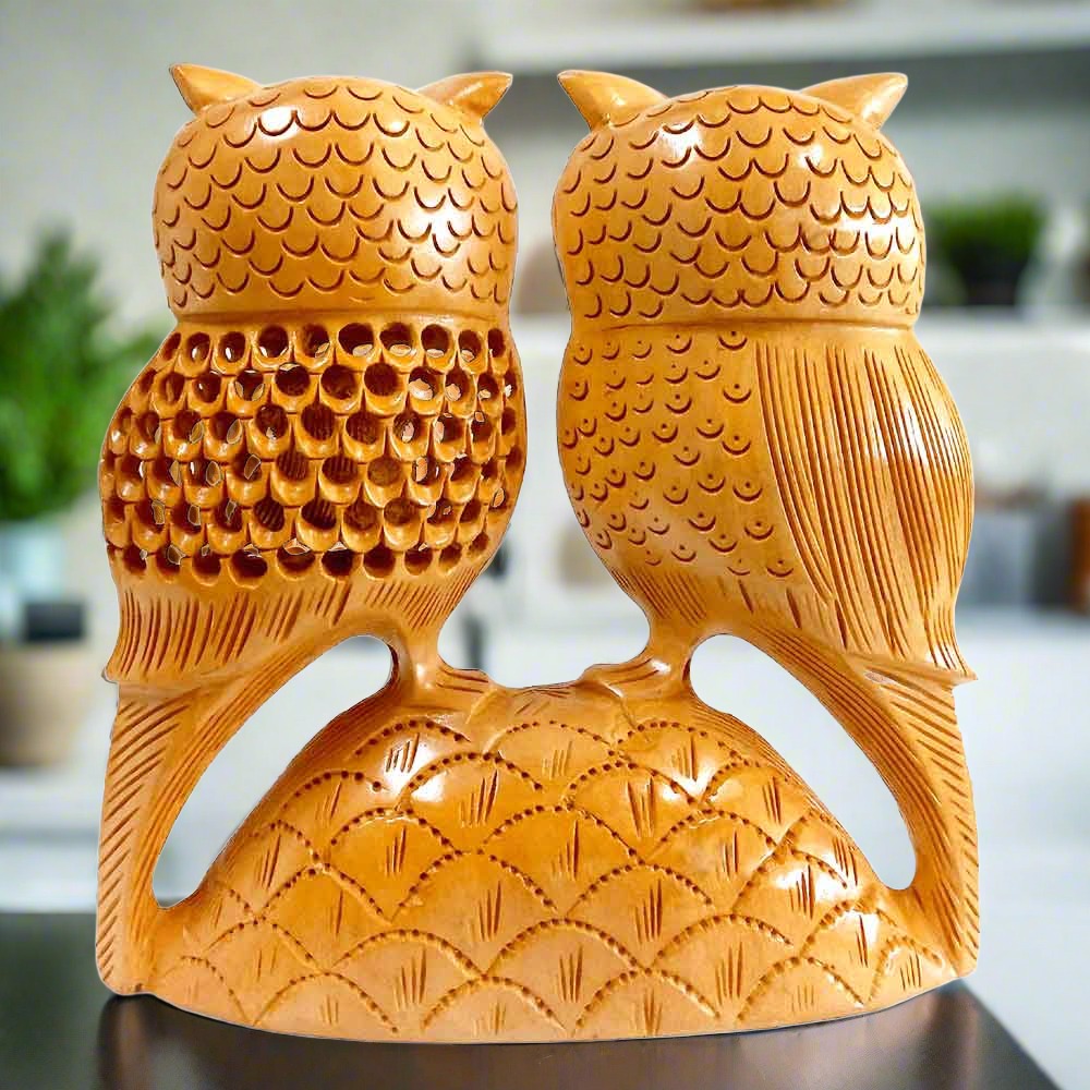 Side view 15x15x5cm wooden owl statue showing baby owl inside auspicious Vastu home decor