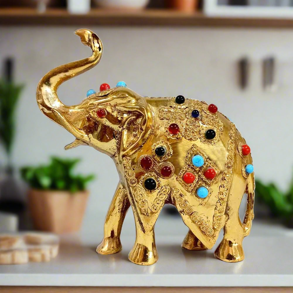 Handcrafted pure brass lucky elephant with upright trunk and colorful stone inlays, 12cm Rajasthan decor piece.