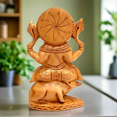 A carved Kadamba wood Ganpati murti, a completely handmade piece with wonderful workmanship.