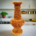 Carved wooden flower pot for home and office decoration.