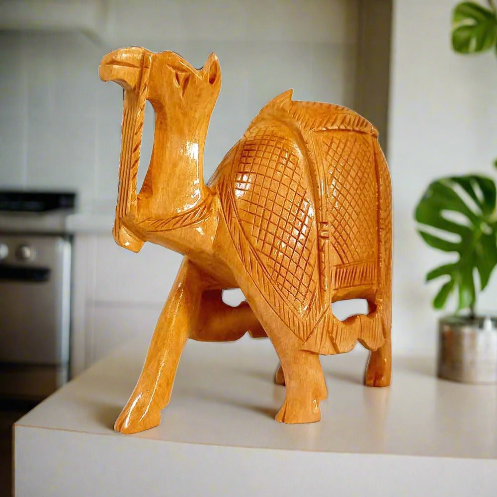 Side profile of kathidar carving camel wooden statue figurine representing Rajasthan heritage