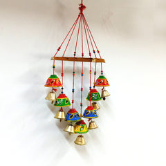 Decorative wind chime toran with multicolored bells and intricate latticework, handmade.