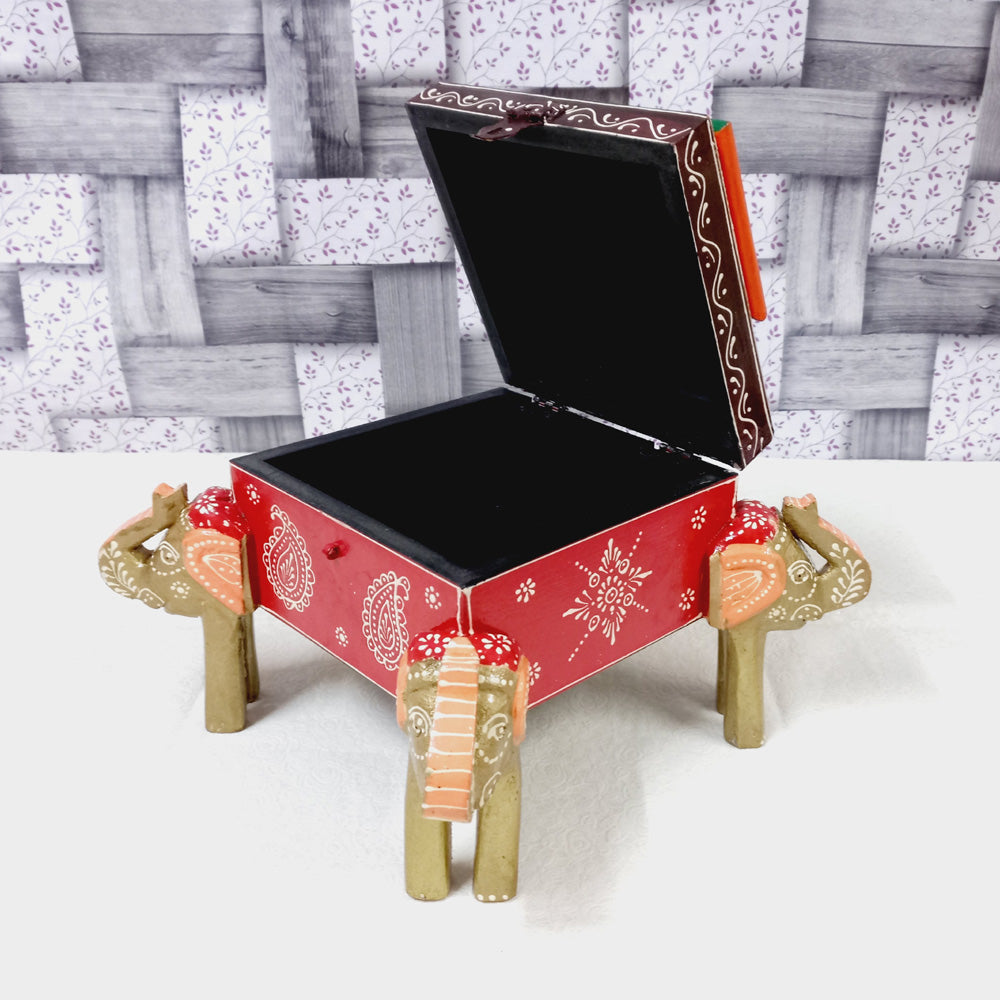  Colorful wooden jewelry box featuring hand-painted elephant motifs on all sides, perfect for valuables and gifting.