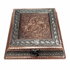 Close-up lid detail of raised peacock and border floral designs on wooden dry fruit box