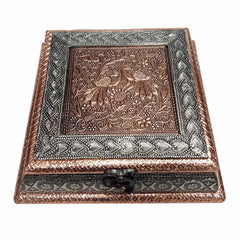 Close-up lid detail of raised peacock and border floral designs on wooden dry fruit box