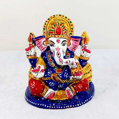 Decorative metal Ganesha idol with vibrant meenakari colors, designed for car dashboard, puja, and gifting
