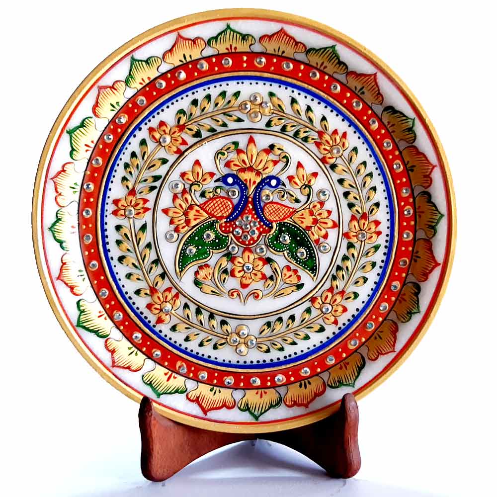 A beautiful decorative marble platter with a stand for easy display.