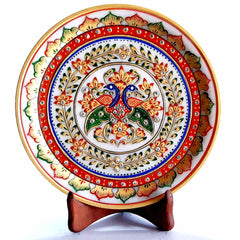 A beautiful decorative marble platter with a stand for easy display.