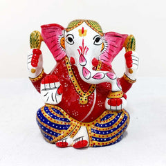 Decorative metal Ganesha idol featuring colorful meenakari painting, designed for worship and gifting occasions