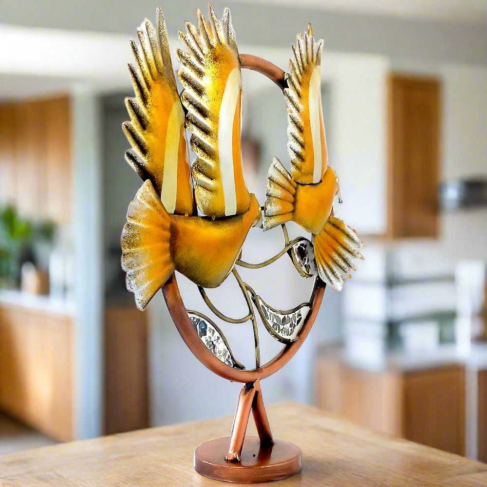 An elegant decorative metal swallow sculpture, designed for wall hanging.