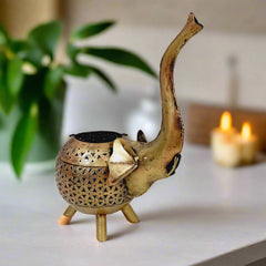 Decorative modern elephant candle holder made of metal with golden mesh design, ideal for Diwali and home decor.