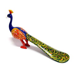 Decorative metal peacock idol with detailed meenakari painting and long wings, enhances home aesthetics