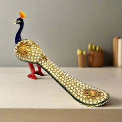 Decorative metal peacock for tabletop, showcase or office desk, featuring stonework and vibrant colors