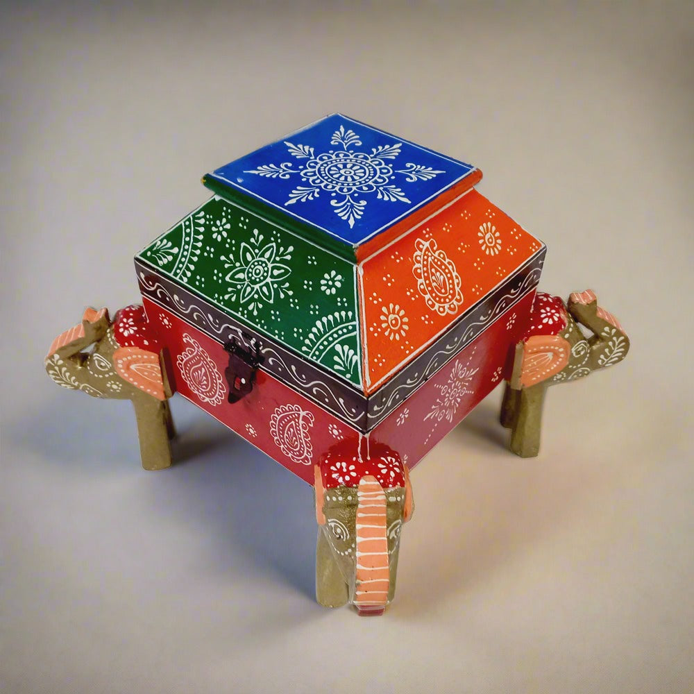 Decorative wooden jewelry box with detailed hand painting and elephant designs on all sides, giving an antique look.