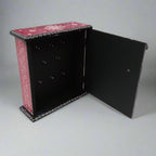  Decorative handcrafted wooden key box with colorful hand painting, enhancing home and office wall decor.