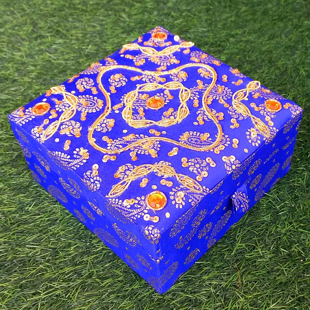 Decorative makeup box with intricate handmade zardosi embroidery, featuring sequins and golden wire on silk fabric.