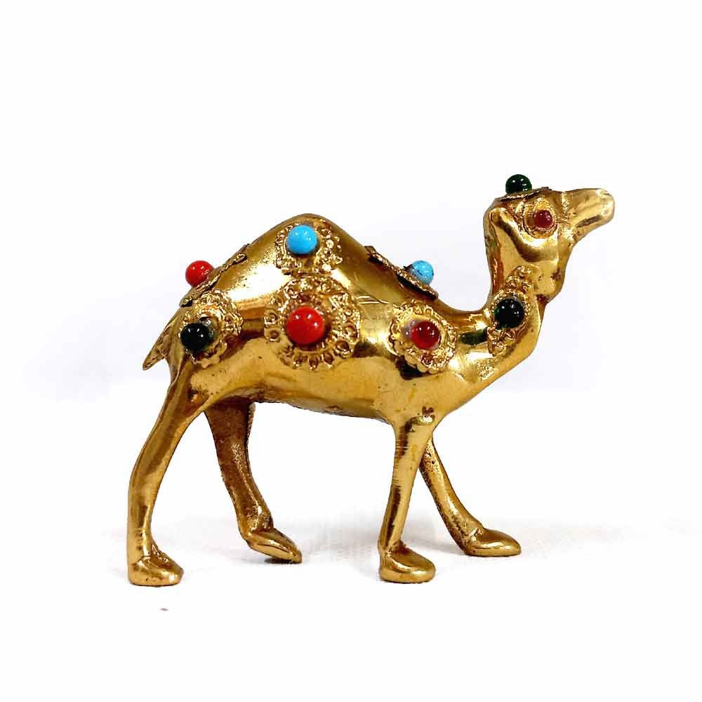 Closeup pure brass camel sculpture showcasing intricate stone work, traditional Rajasthani art.