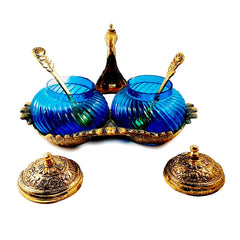Metal and glass duck bowl set with turquoise bowls and spoons, elegant for dining table or office desk.
