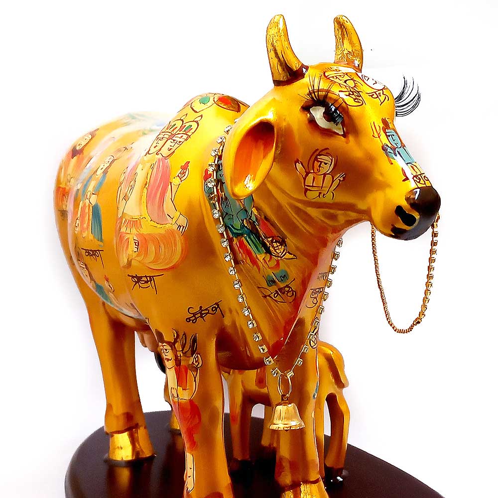 A divine Kamdhenu cow of plenty, believed to fulfill wishes and bring abundance.