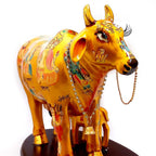 A divine Kamdhenu cow of plenty, believed to fulfill wishes and bring abundance.