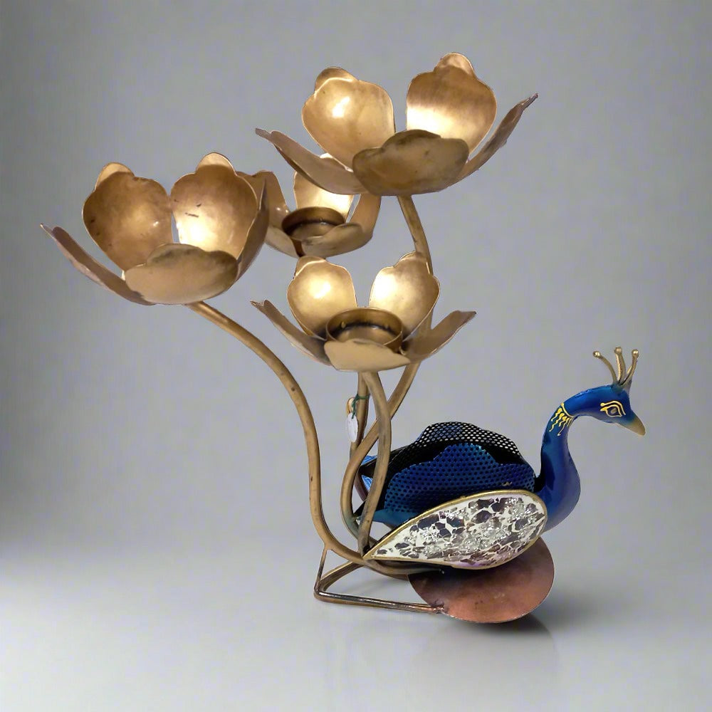 Elegant metal peacock candle holder featuring colorful hand painting and glass feather decoration, suitable for gifts and decoration.